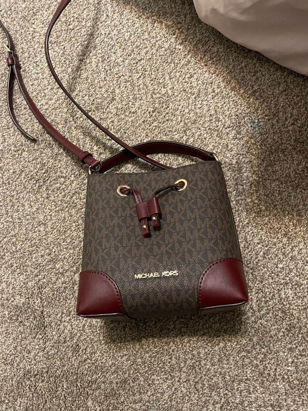 Michael Kors Brown Monogram Bucket Bag with Burgundy Trim